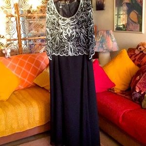 JKARA sparkling beaded chiffon evening gown.